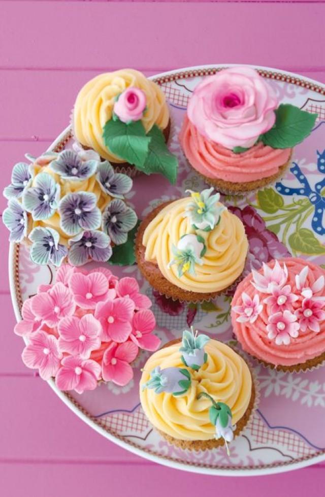 Beautiful Rose Cupcakes With Flower Shapes On The Top Beautiful Rose Cupcakes With Flower Shapes On The Top
